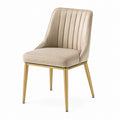 Silla de comedor tapizada en terciopelo beige con patas doradas de metal